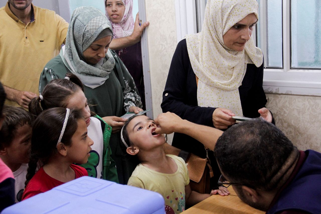 A Palestinian child is vaccinated against polio in Jabalya, northern Gaza, on September 10.