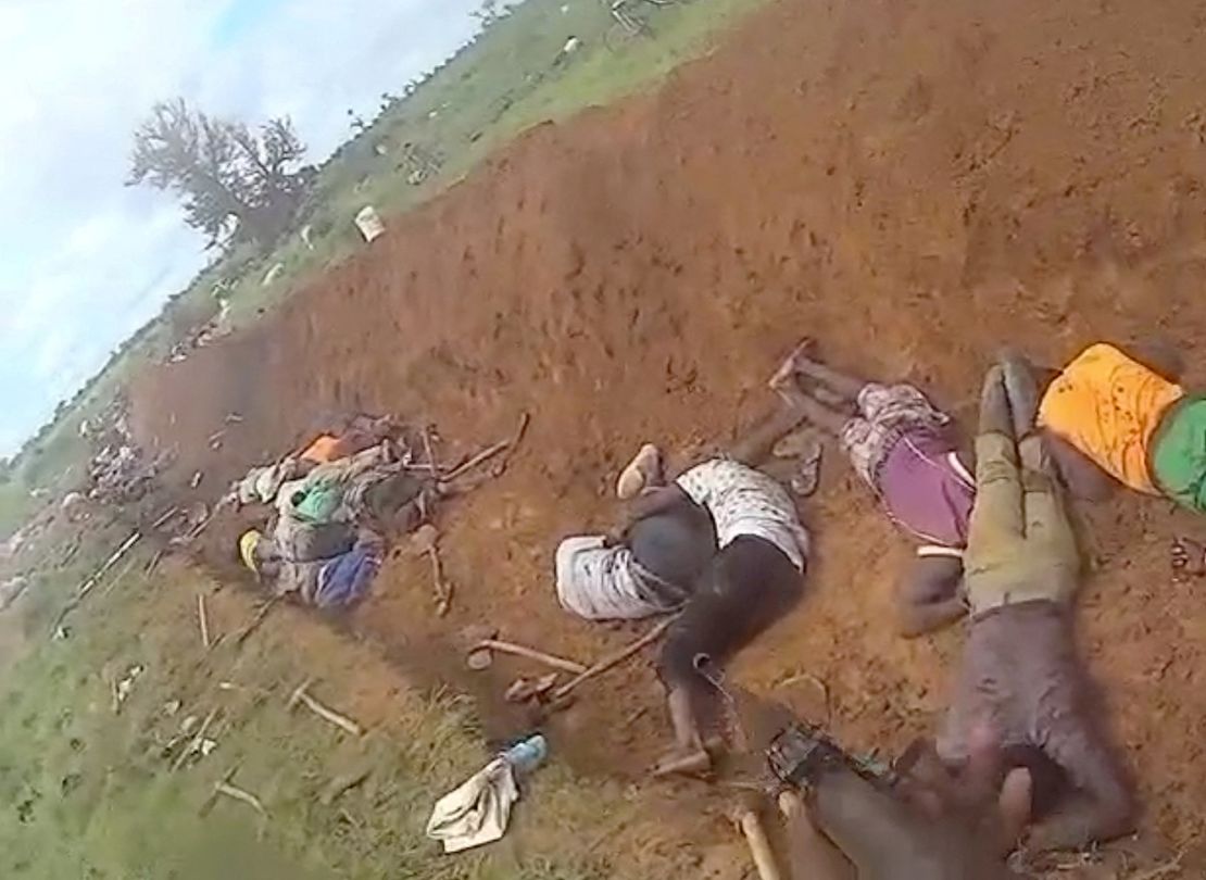 A screenshot from a video shared on social media on August 24, 2024, shows the bodies of people killed by jihadists while digging a trench to protect their town of Barsalogho, Burkina Faso.