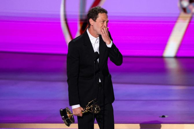 Moss-Bachrach <a href="https://www.cnn.com/entertainment/live-news/emmy-awards-levy-09-15-24#h_ca971270bf897b3e16c88068dee8434a">accepts the Emmy</a> for outstanding supporting actor in a comedy series ("The Bear"). He also won the award at the last Emmys.