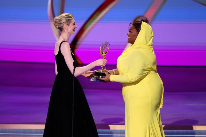 Da'Vine Joy Randolph, right, hands an Emmy Award to Elizabeth Debicki, who had just <a href="https://www.cnn.com/entertainment/live-news/emmy-awards-levy-09-15-24#h_ff17223b5da1c6e92e16c712337dcc9b">won outstanding supporting actress in a drama series</a> ("The Crown"). Debicki won for her portrayal of the late Princess Diana.