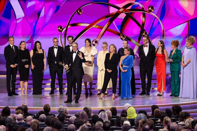 John Oliver accepts the Emmy for outstanding scripted variety series ("Last Week Tonight with John Oliver").