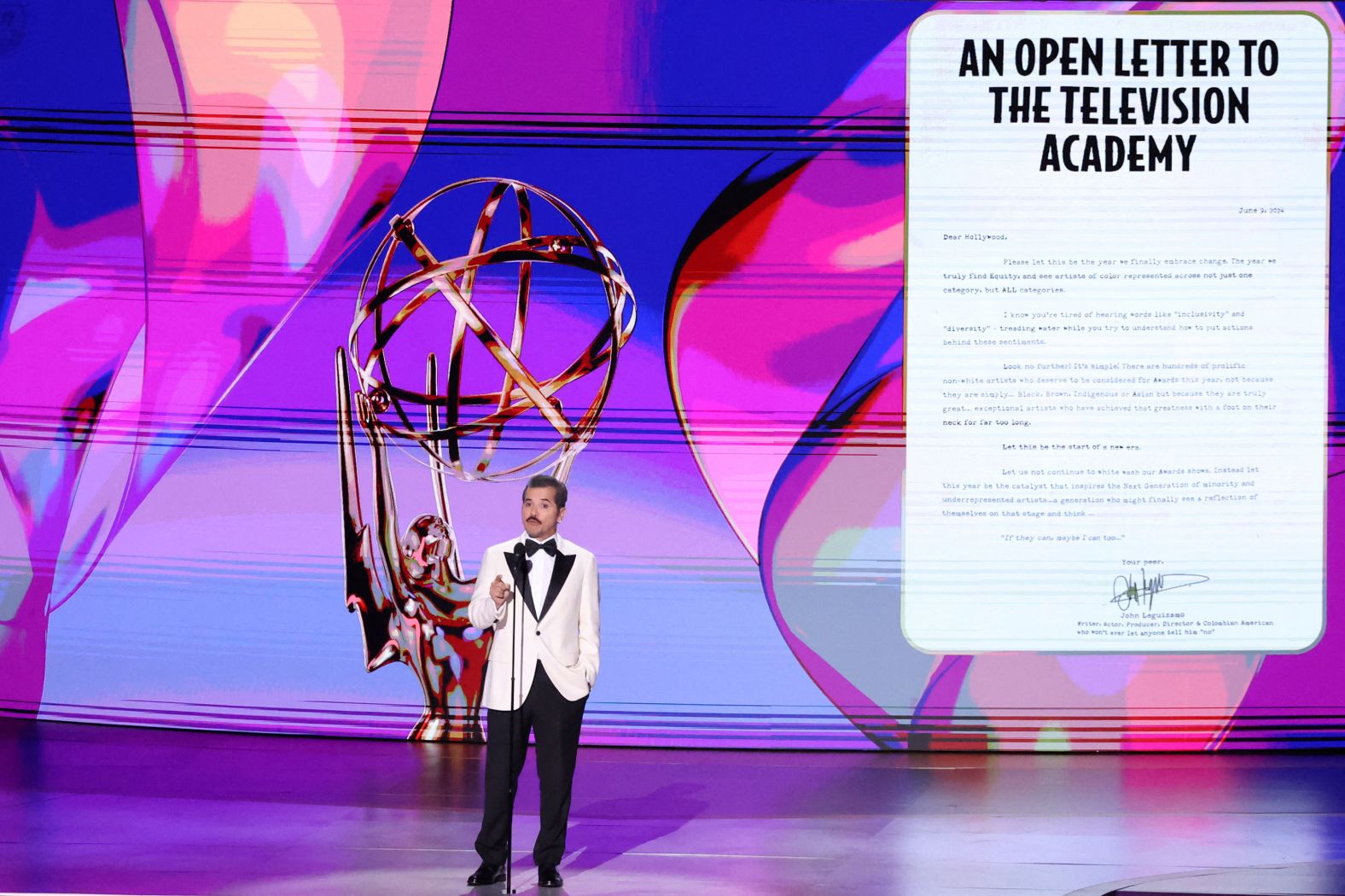 Actor John Leguizamo speaks on stage <a href="index.php?page=&url=https%3A%2F%2Fwww.cnn.com%2Fentertainment%2Flive-news%2Femmy-awards-levy-09-15-24%23h_d405aa3671ef8c9ab976509228bb84fc">to recognize the diversity among the night's nominees</a>. He referenced an open letter he once wrote to the Television Academy, urging them to embrace more diversity. “This show tonight is proof that our industry is making progress,” he said.