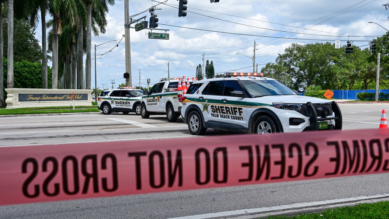 Police vehicles block a road, as law enforcement personnel continue to investigate the area around Trump International Golf Club, after an apparent assassination attempt on Republican presidential nominee and former U.S. President Donald Trump, after a gunman was found at the Trump's golf course, in West Palm Beach, Florida, U.S. September 16, 2024. REUTERS/Giorgio Viera