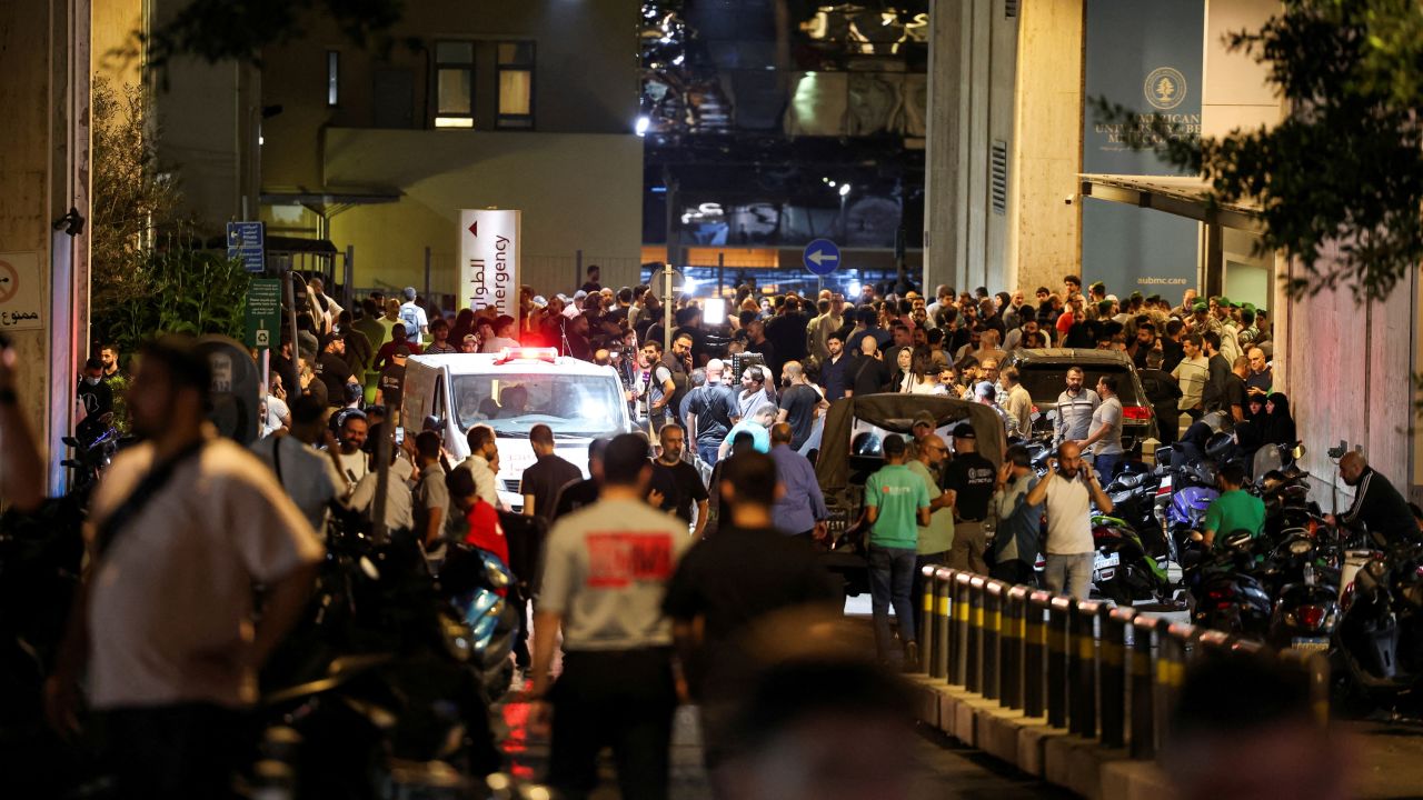 People gather outside American University of Beirut Medical Center (AUBMC) as more than 1,000 people, including Hezbollah fighters and medics, were wounded when the pagers they use to communicate exploded across Lebanon, according to a security source, in Beirut, Lebanon September 17, 2024. REUTERS/Mohamed Azakir TPX IMAGES OF THE DAY