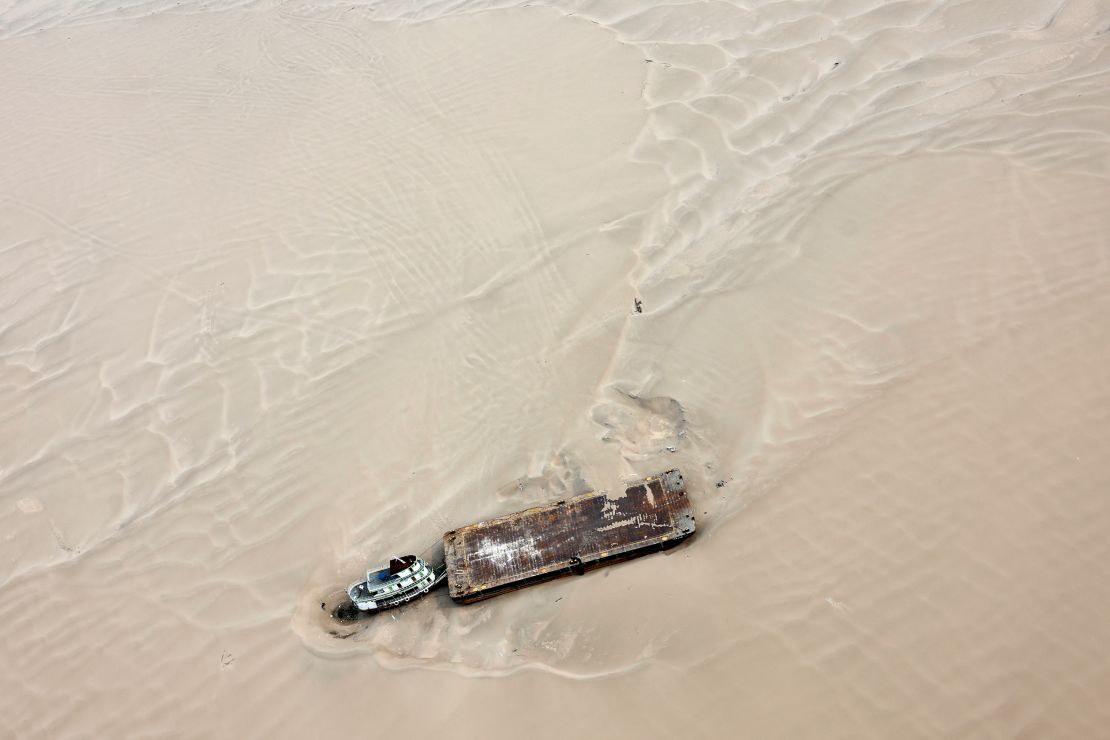 A hopper barge stranded on a sandbank at the Solimões River, near Tefé, Amazonas state, Brazil on September 17, 2024.