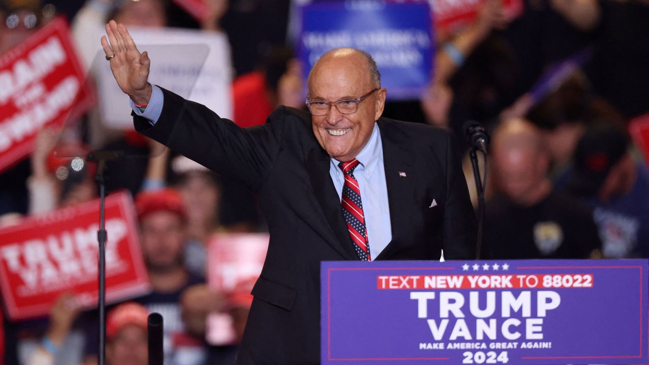 Former mayor of New York City Rudy Giuliani takes the stage during a rally held by then-candidate Donald Trump, in Uniondale, New York, on September 18, 2024.