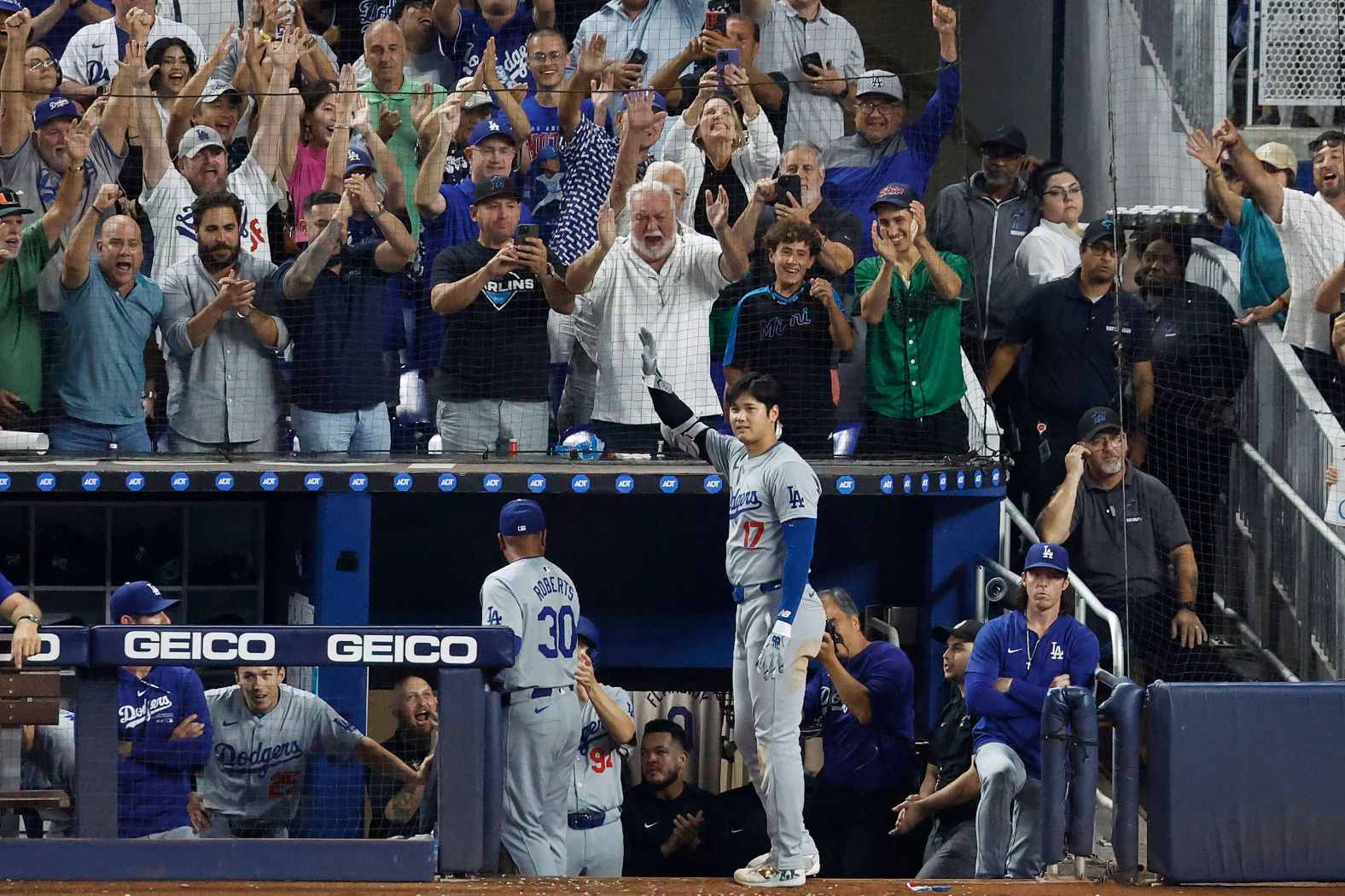 Los Angeles Dodgers superstar Shohei Ohtani receives a standing ovation after hitting his 50th home run of the season, becoming <a >the inaugural member of the 50-50 club</a>, during a game against the Miami Marlins in Miami on Thursday, September 19. A 50-50 season consists of 50+ home runs and 50+ stolen bases. Ohtani stole his 50th and 51st base earlier in the game.