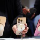 A man checks an iPhone 16 Pro as the new iPhone 16 series smartphones go on sale at an Apple store in Beijing, China September 20, 2024.
