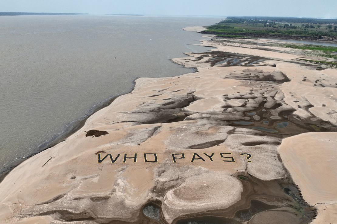 A message by Greenpeace activists on sandbanks of the Solimões River on September 20, 2024.