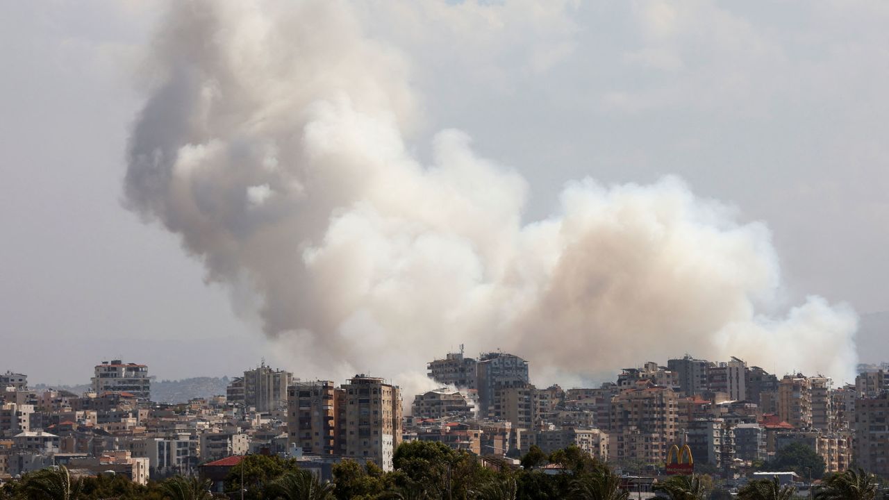 Smoke billows over southern Lebanon following Israeli strikes, amid ongoing cross-border hostilities between Hezbollah and Israeli forces, as seen from Tyre, southern Lebanon on Monday, September 23.