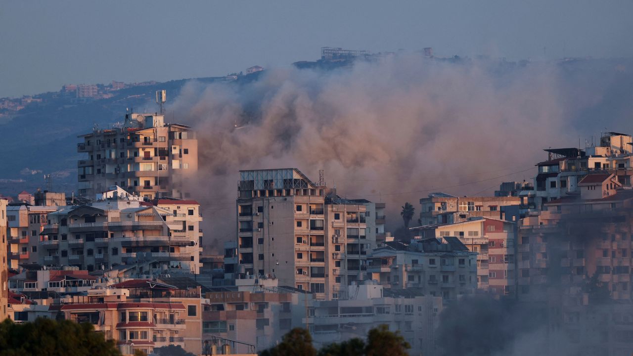 Smoke billows over southern Lebanon following an Israeli strike, as seen from Tyre, Lebanon, on Wednesday.