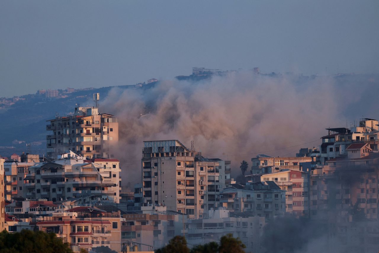 Smoke billows over southern Lebanon following an Israeli strike, as seen from Tyre, Lebanon, on Wednesday.