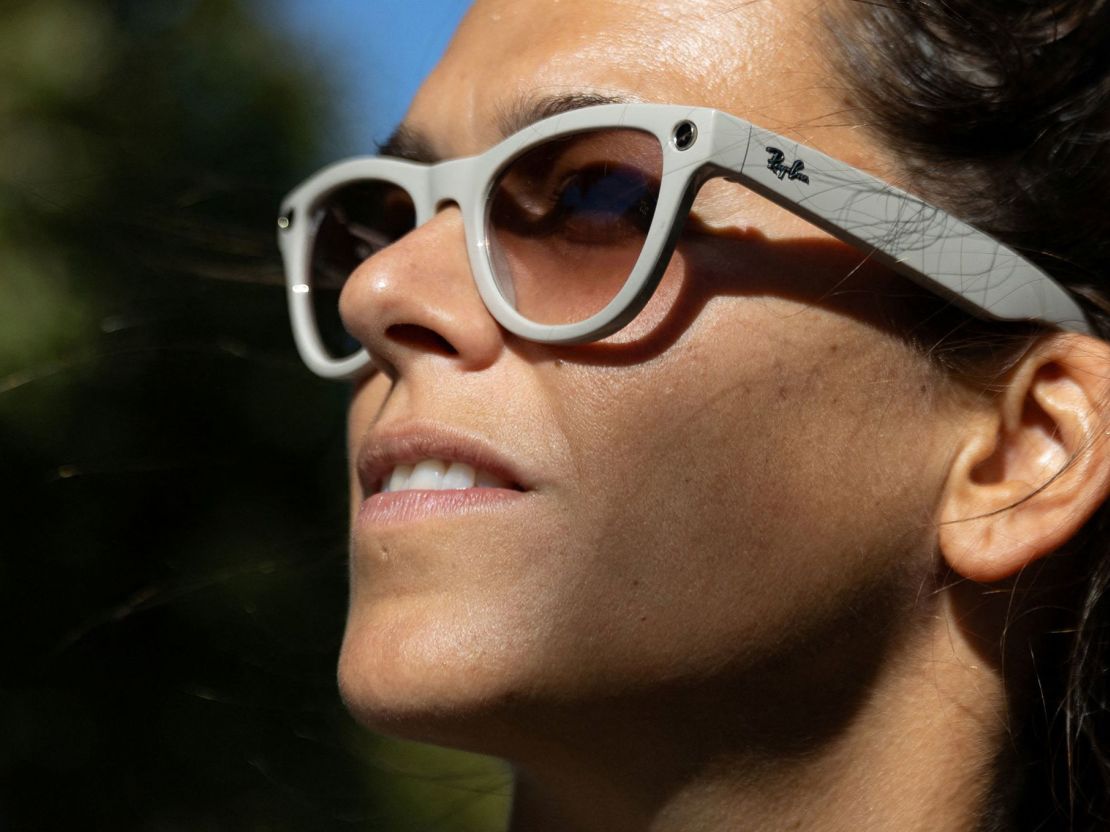 A Meta employee poses with the company's Ray-Ban sunglasses at the Meta Connect event in Menlo Park, California, on September 24, 2024.