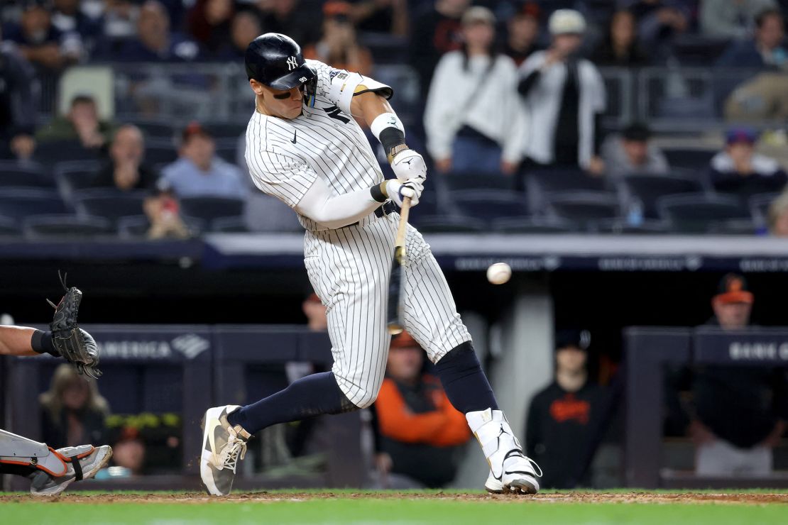 Aaron Judge hits a three-run home run against the Baltimore Orioles in the ninth inning at Yankee Stadium.