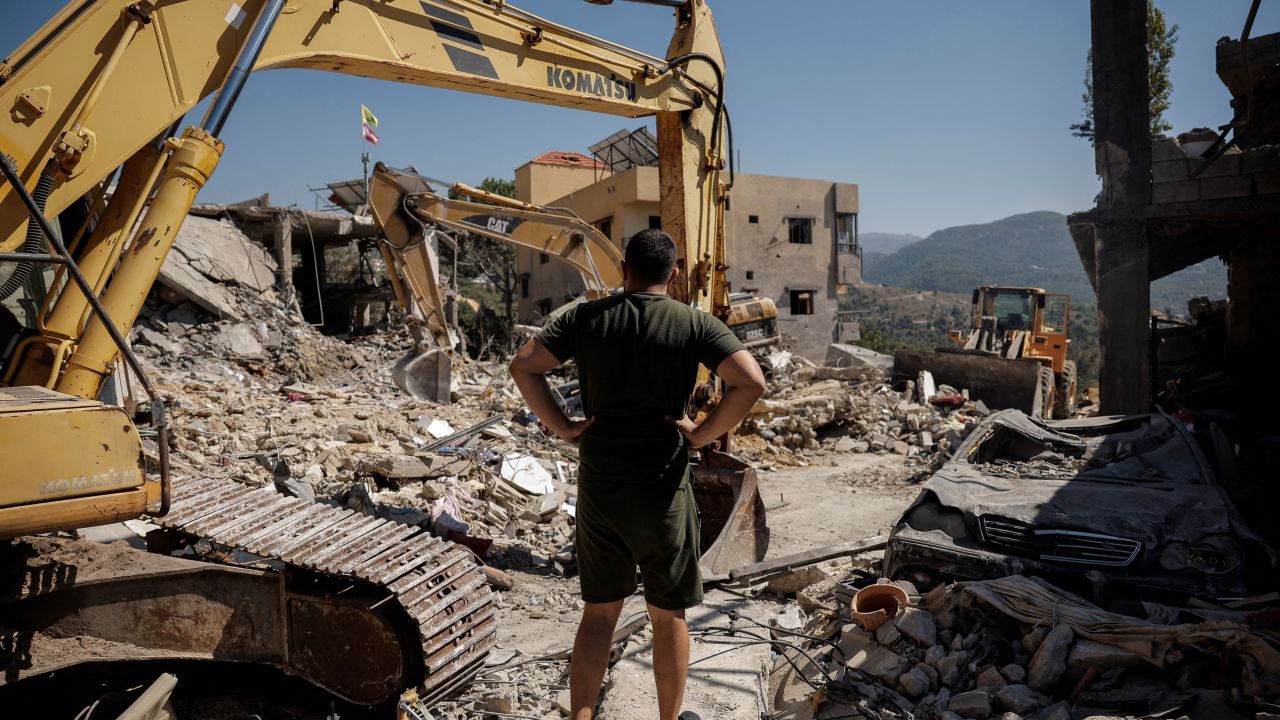 A man looks at destroyed houses amid an ongoing search for survivors, a day after an Israeli strike on residential buildings in Maaysrah, Lebanon, on Thursday, September 26.