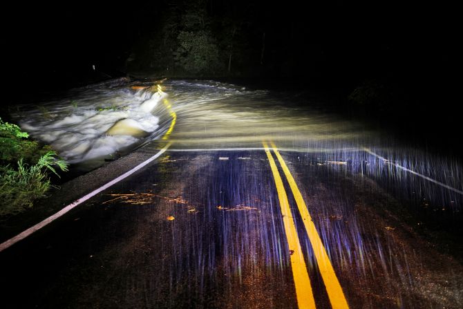 Flood water washes over Guy Ford Road bridge on the Watauga River in Sugar Grove, North Carolina, on September 26.