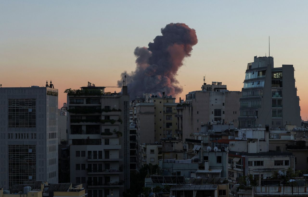 Smoke rises behind buildings in Beirut, Lebanon, on Friday, September 27.