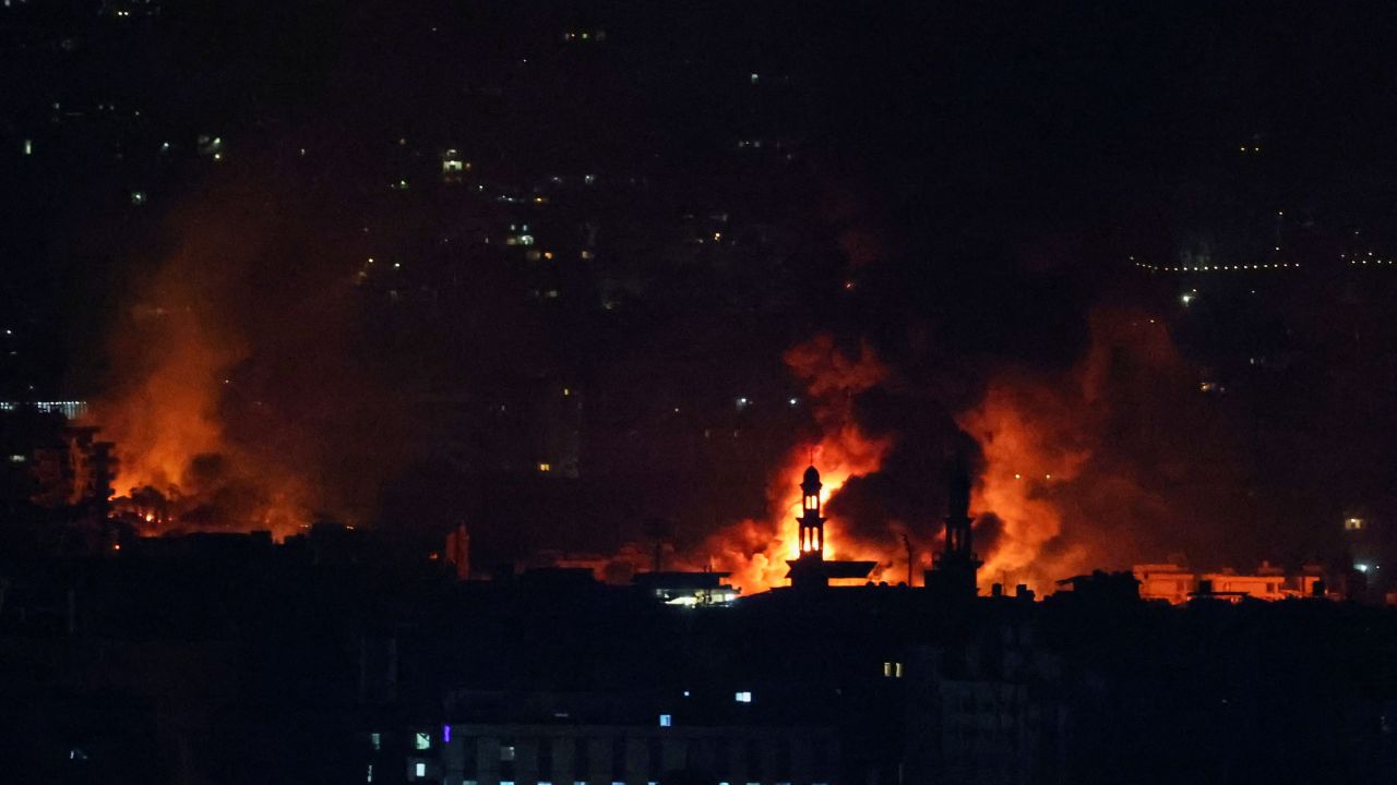 Smoke billows over Beirut's southern suburbs as seen from Sin El Fil, Lebanon, on Saturday, September 28.