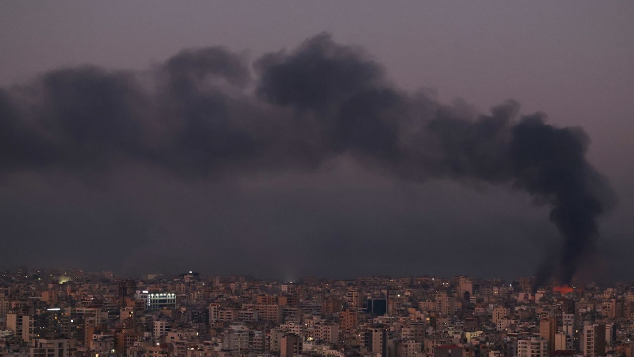 Smoke billows over Beirut's southern suburbs after a night of Israeli strikes, as seen from Sin El Fil, Lebanon, on September 28, 2024.