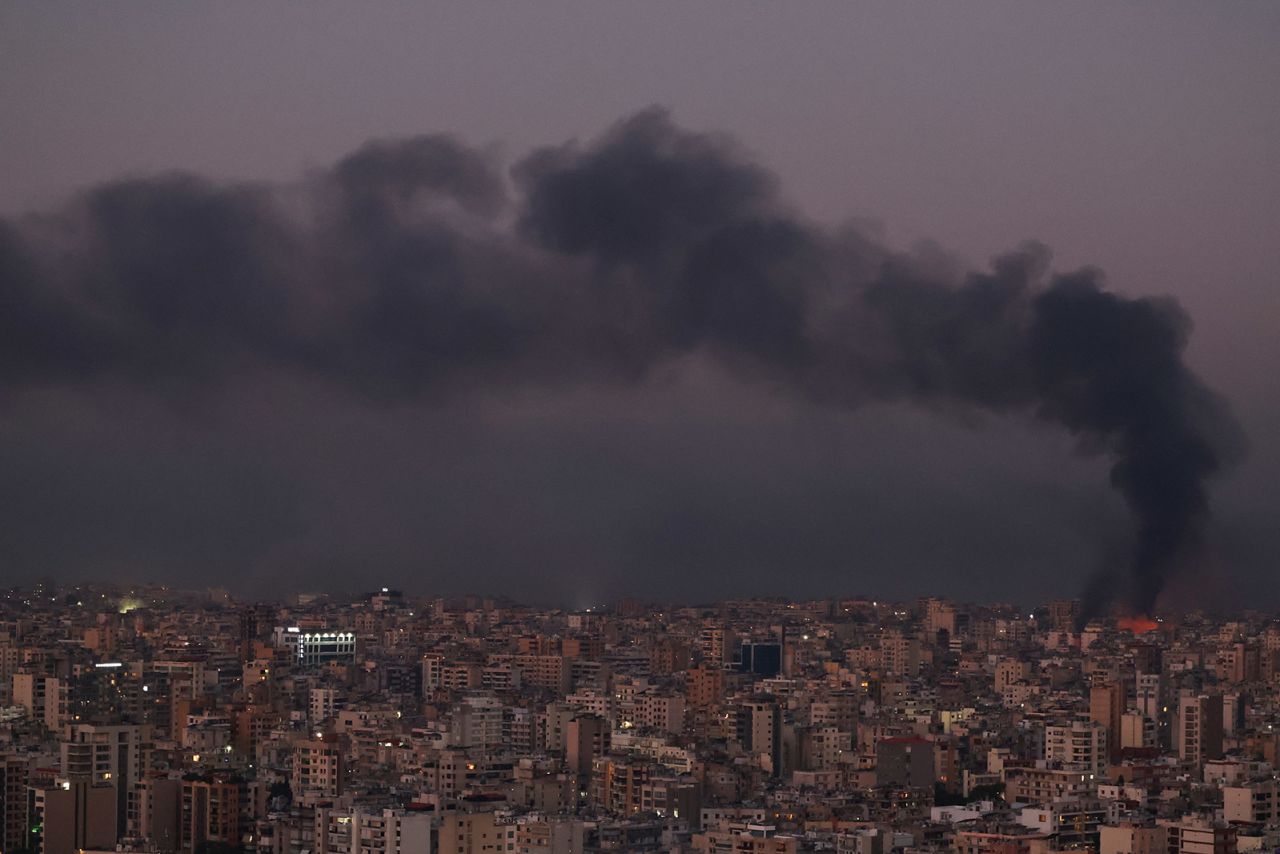 Smoke billows over Beirut's southern suburbs after a night of Israeli strikes, as seen from Sin El Fil, Lebanon, on September 28, 2024.