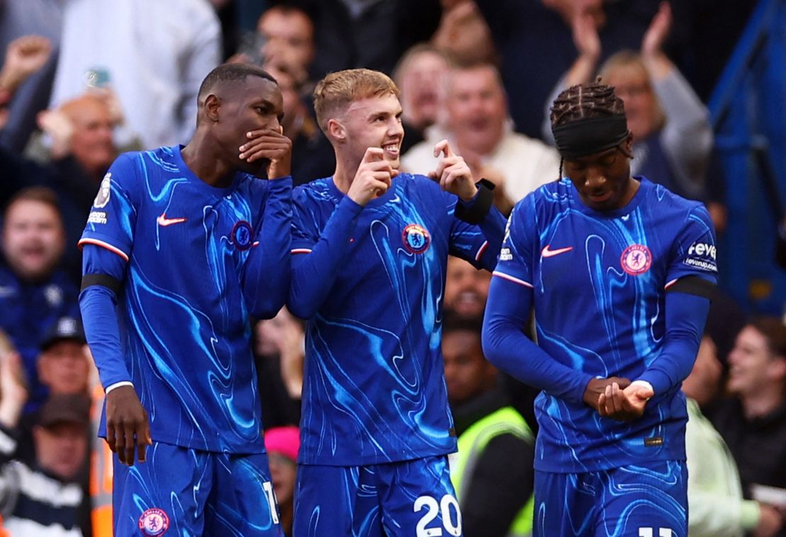 Cole Palmer celebrates scoring for Chelsea against Brighton.