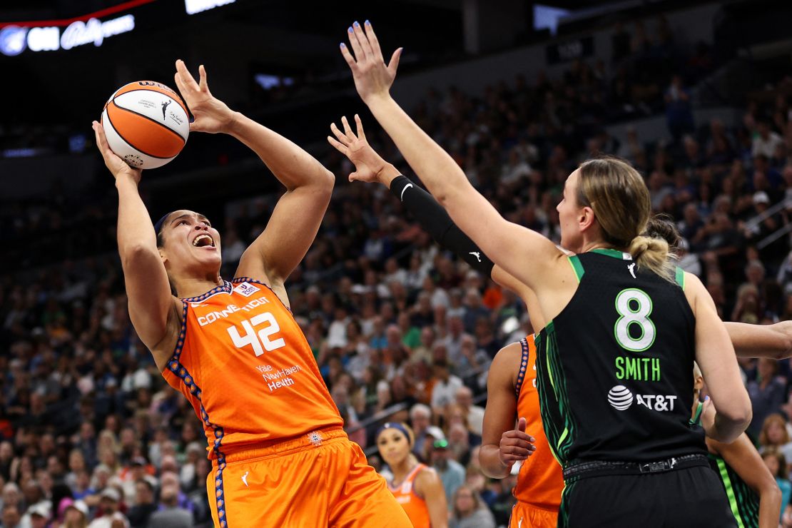 Connecticut Sun forward Brionna Jones shoots over Minnesota Lynx forward Alanna Smith.