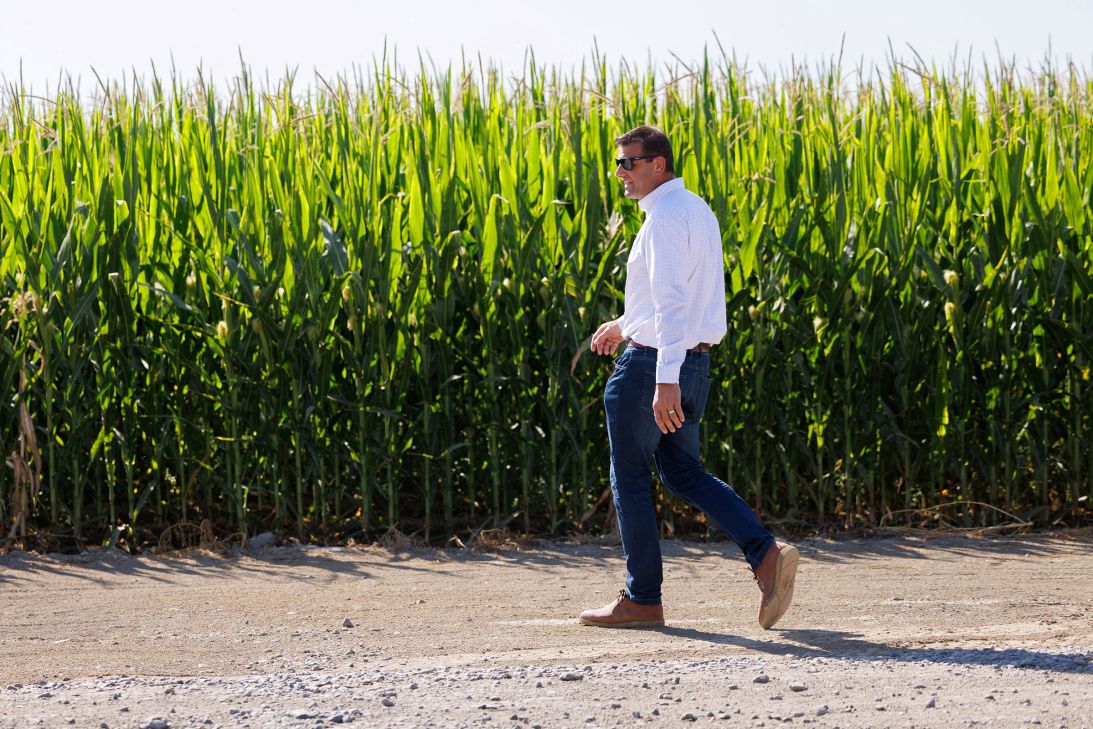 Rep. David Valadao walks past a small field of corn at his family's dairy farm in California's 22nd congressional district in Hanford, California, on September 21, 2024.