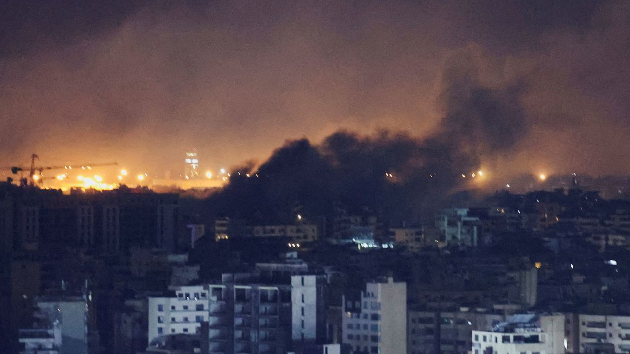 Smoke rises over Beirut's southern suburbs after a strike, as seen from Sin El Fil, Lebanon, on Tuesday, October 1.