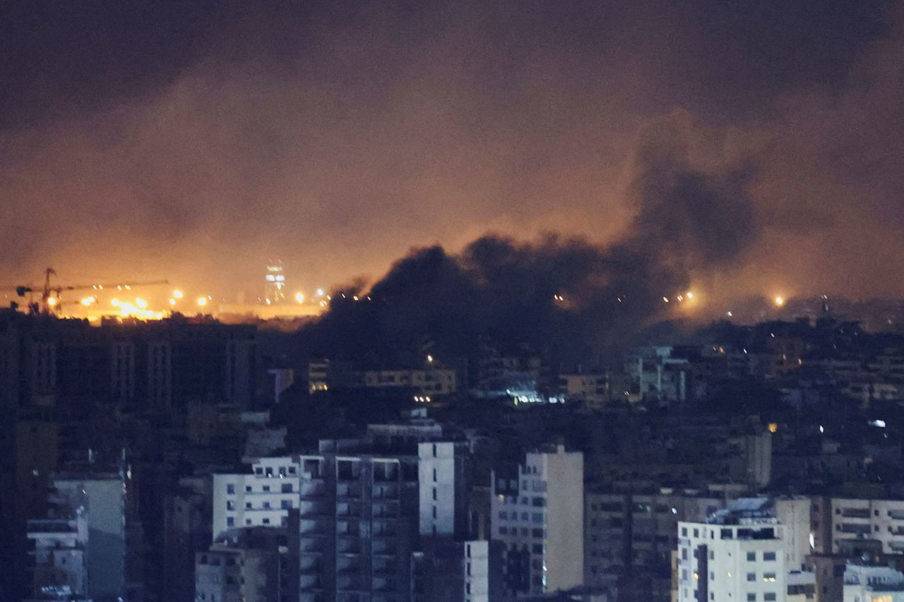 Smoke rises over Beirut's southern suburbs after a strike, as seen from Sin El Fil, Lebanon, on Tuesday, October 1.