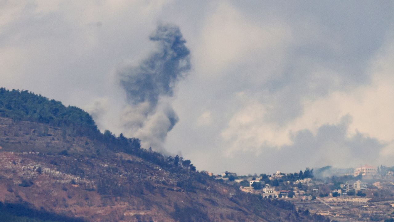 Smoke billows near a village in southern Lebanon after an Israeli air strike, as seen from northern Israel, on October 1.