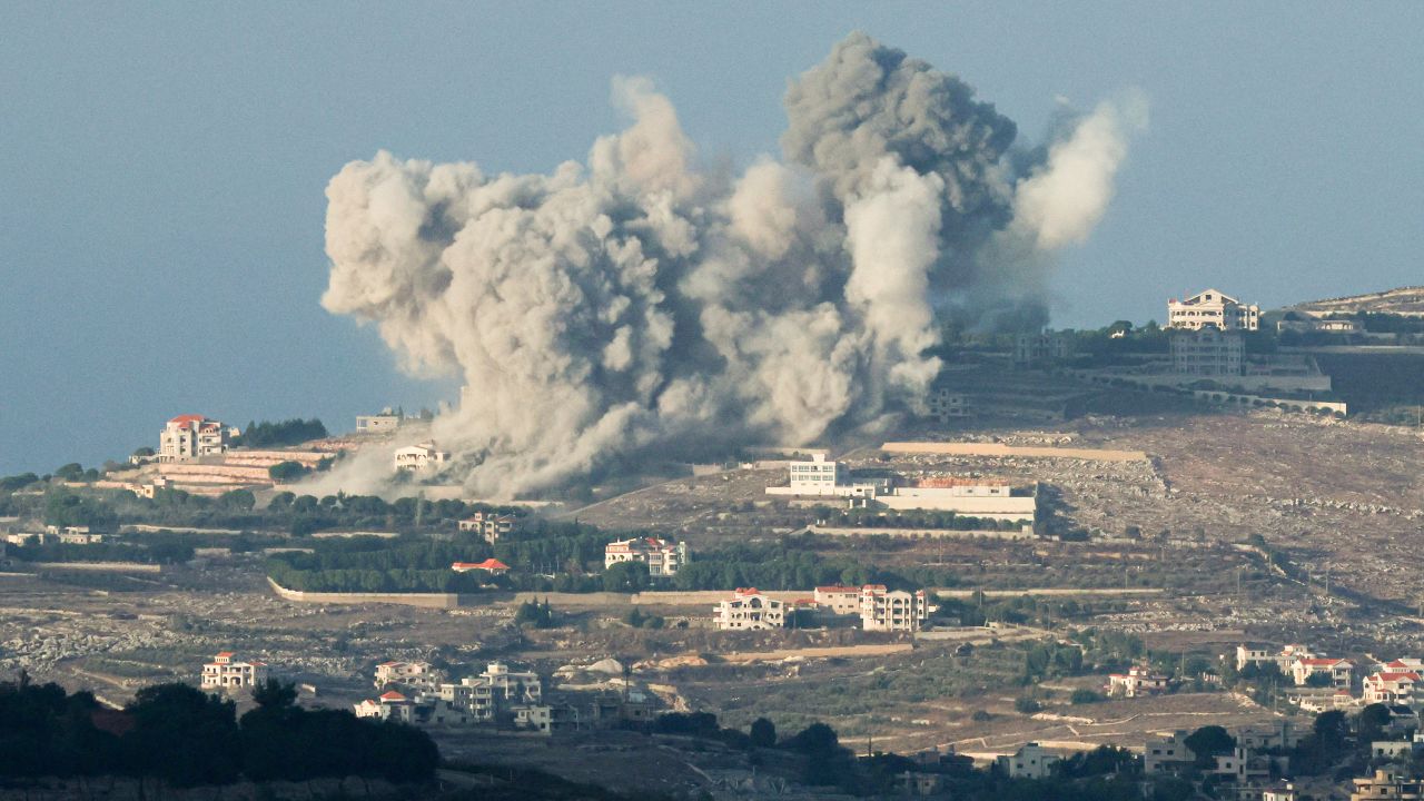 Smoke billows after an Israeli Air Force air strike on a village in southern Lebanon, amid cross-border hostilities between Hezbollah and Israel, as seen from northern Israel October 1, 2024.