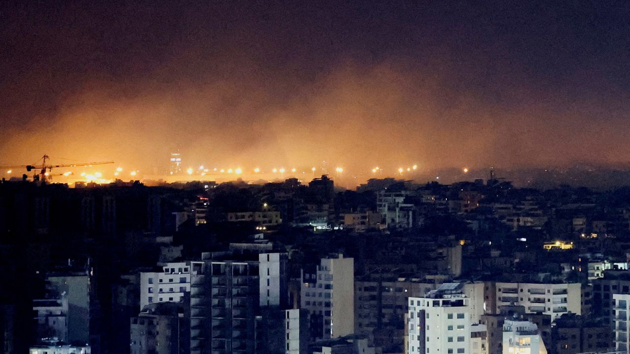 Smoke rises over Beirut's southern suburbs after a strike, as seen from Sin El Fil, Lebanon, on October 1, 2024.