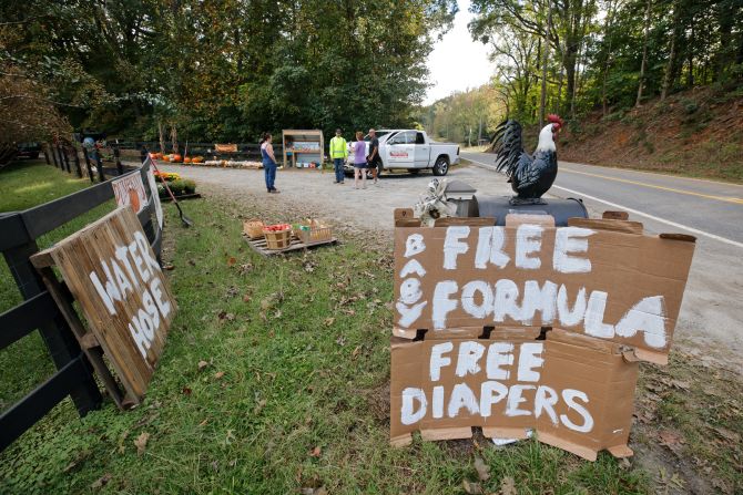 Local farmers offer free food, baby formula and diapers to people as some supplies remain difficult to find in the aftermath of Hurricane Helene, on the outskirts of Columbus, North Carolina, on Tuesday.