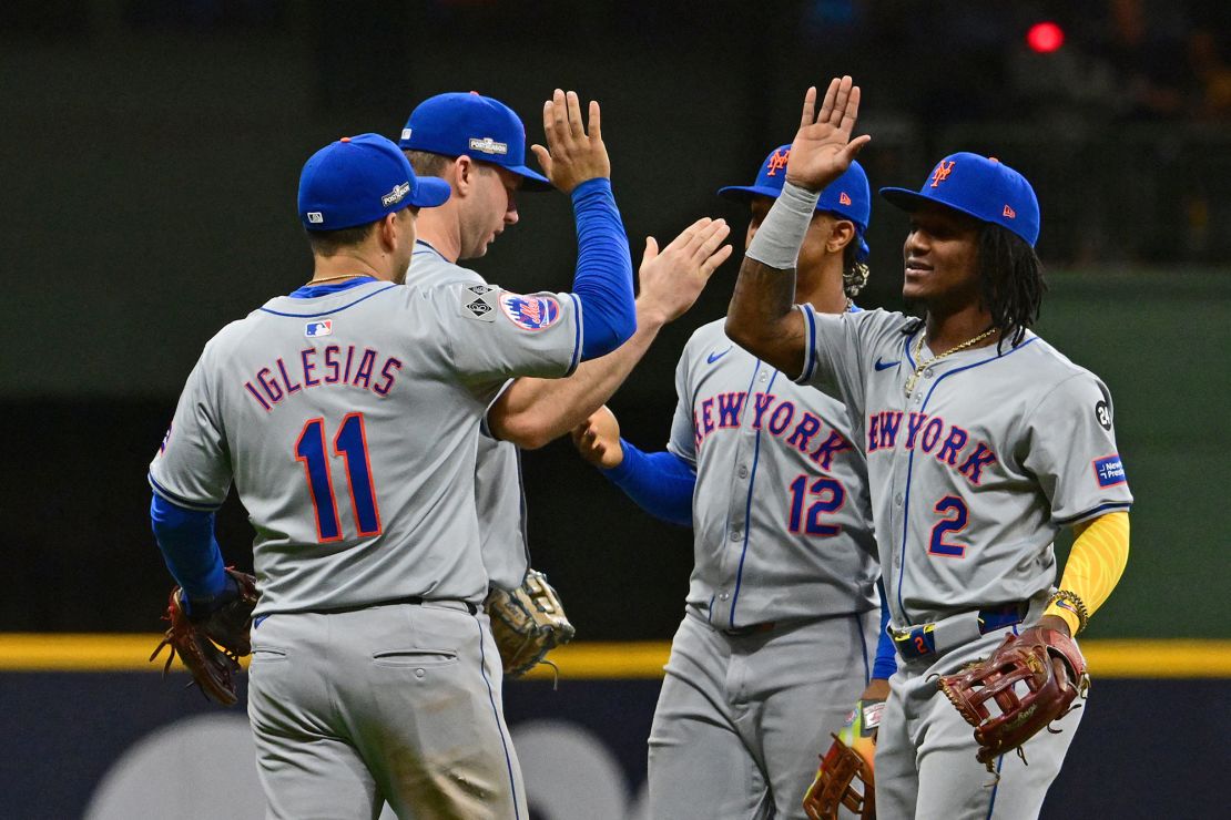 Jose Iglesias, Luisangel Acuña and teammates react to the win over the Milwaukee Brewers.