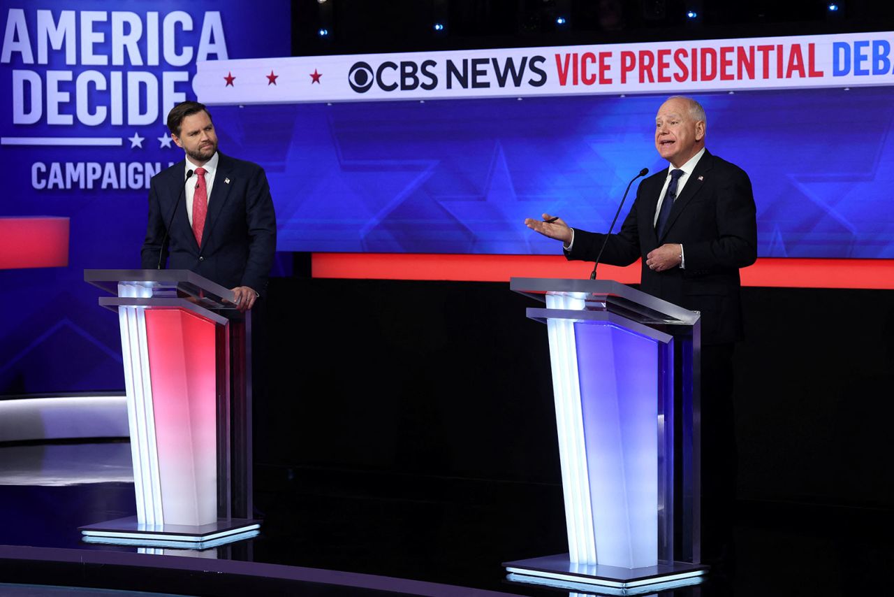 US Sen. JD Vance, left, and Minnesota Gov. Tim Walz take part in a vice presidential debate at the CBS Broadcast Center in New York on Tuesday, October 1.