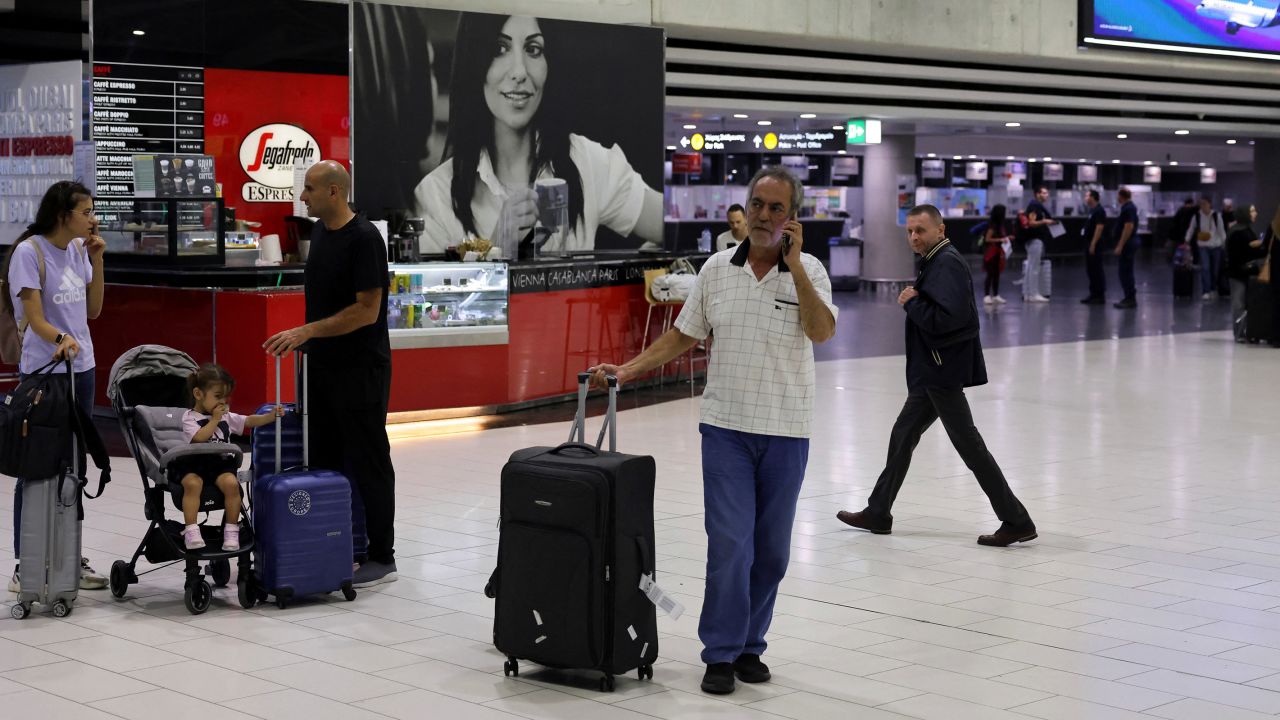 Lebanese citizen Ali Abdul Hassan arrives at Larnaca International Airport, as many people seek refuge abroad due to ongoing hostilities between Hezbollah and Israeli forces, in Larnaca, Cyprus, on October 2, 2024.