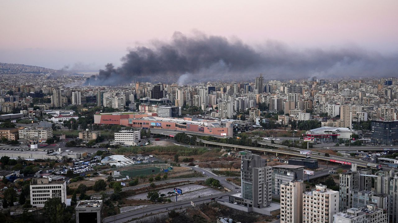 Smoke billows over Beirut, after overnight Israeli air strikes, as seen from Sin El Fil, Lebanon, on October 3.