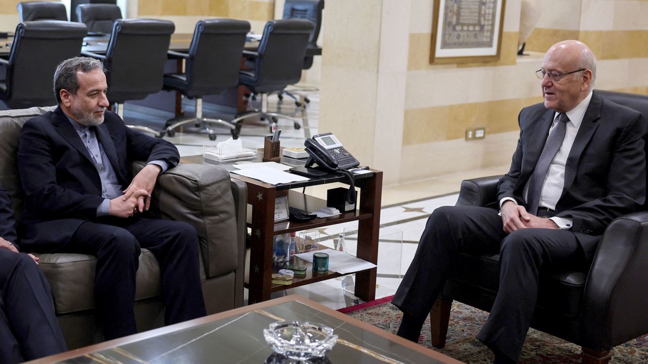 Iranian Foreign Minister Abbas Araghchi, left, meets with Lebanon's caretaker Prime Minister Najib Mikati in Beirut, Lebanon, on October 4.