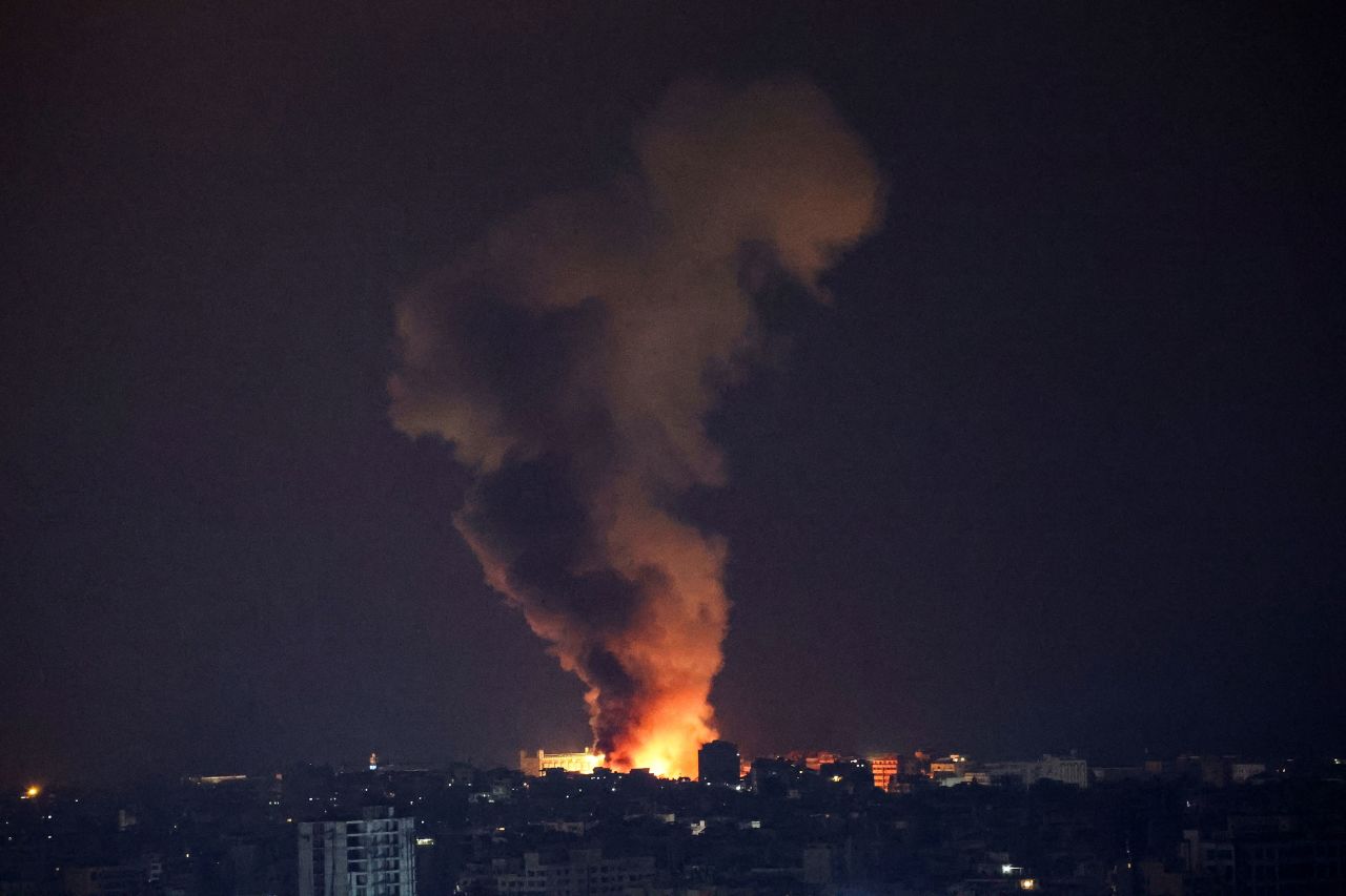 Smoke and flames rise over Beirut's southern suburbs, as seen from Sin El Fil, Lebanon, on Saturday.