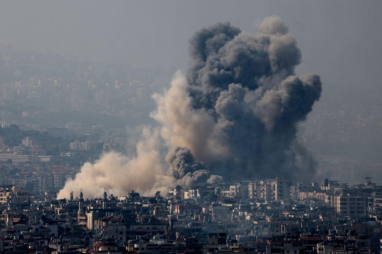 Smoke rises over Dahiyeh, in the southern suburbs of Beirut, Lebanon, after Israeli airstrikes on October 6, as seen from Sin el Fil, Lebanon.