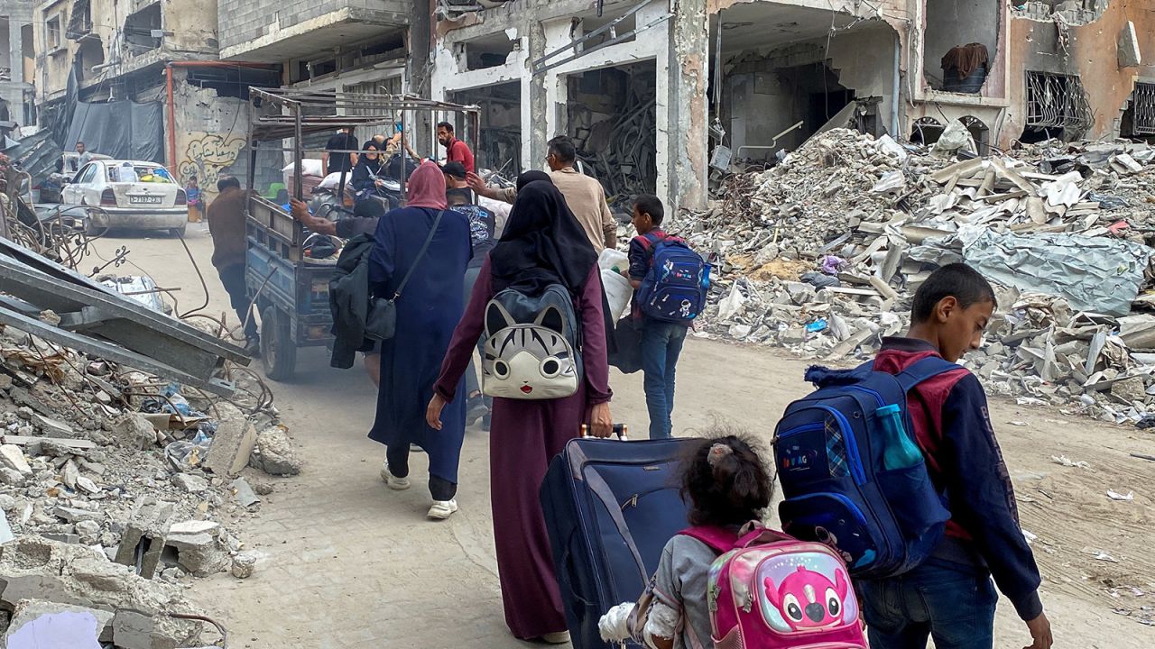 Displaced Palestinians flee areas in the northern Gaza Strip following an Israeli evacuation order in Jabalya, on October 6, 2024.