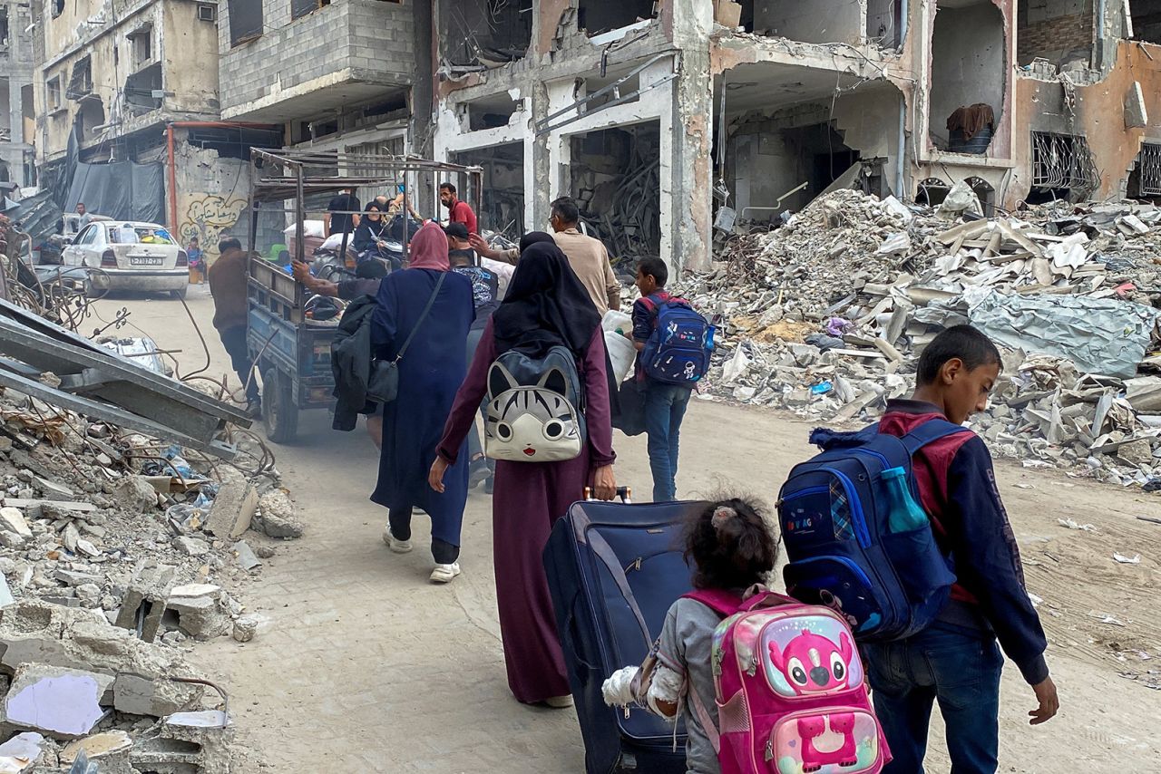 Displaced Palestinians flee areas in the northern Gaza Strip following an Israeli evacuation order in Jabalya, on October 6, 2024.