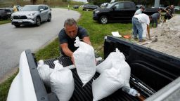 Bob Gendron loads sandbags onto his truck, as they are distributed to Pinellas County residents before the expected arrival of Tropical Storm Milton, in Seminole, Florida, U.S. October 6, 2024. REUTERS/Octavio Jones