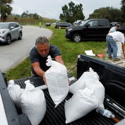 Bob Gendron loads sandbags onto his truck, as they are distributed to Pinellas County residents before the expected arrival of Tropical Storm Milton, in Seminole, Florida, U.S. October 6, 2024. REUTERS/Octavio Jones