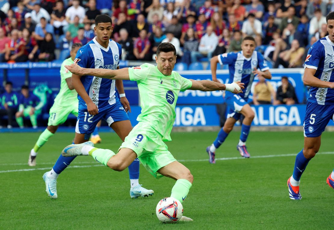 Lewandowski fires home his third goal of the game.