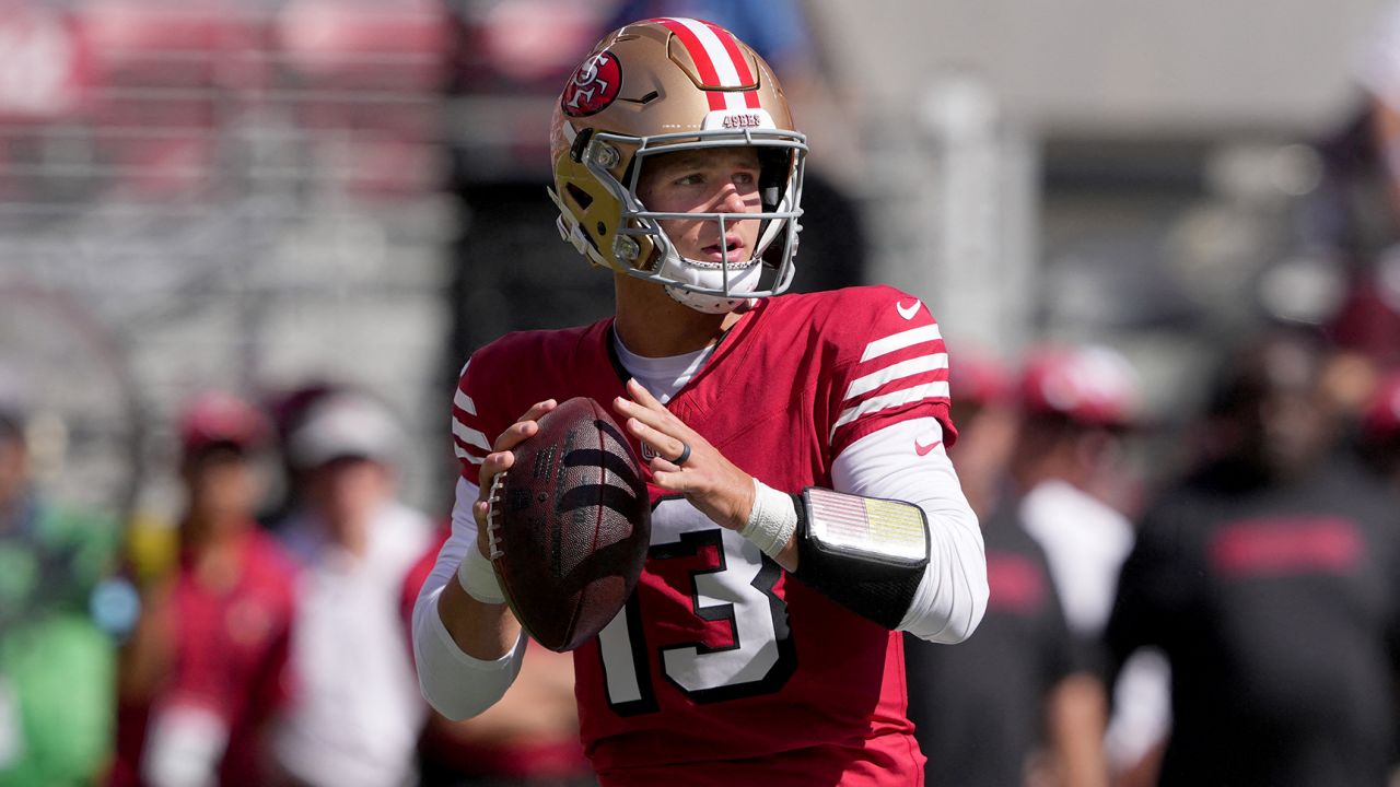 San Francisco 49ers quarterback Brock Purdy looks to pass against the Arizona Cardinals.