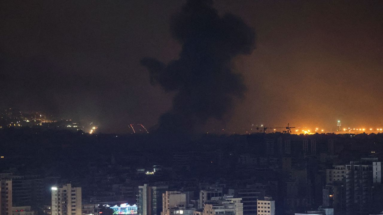 Smoke billows over Beirut's southern suburbs after a strike, as seen from Sin El Fil, Lebanon, on Monday, October 7.