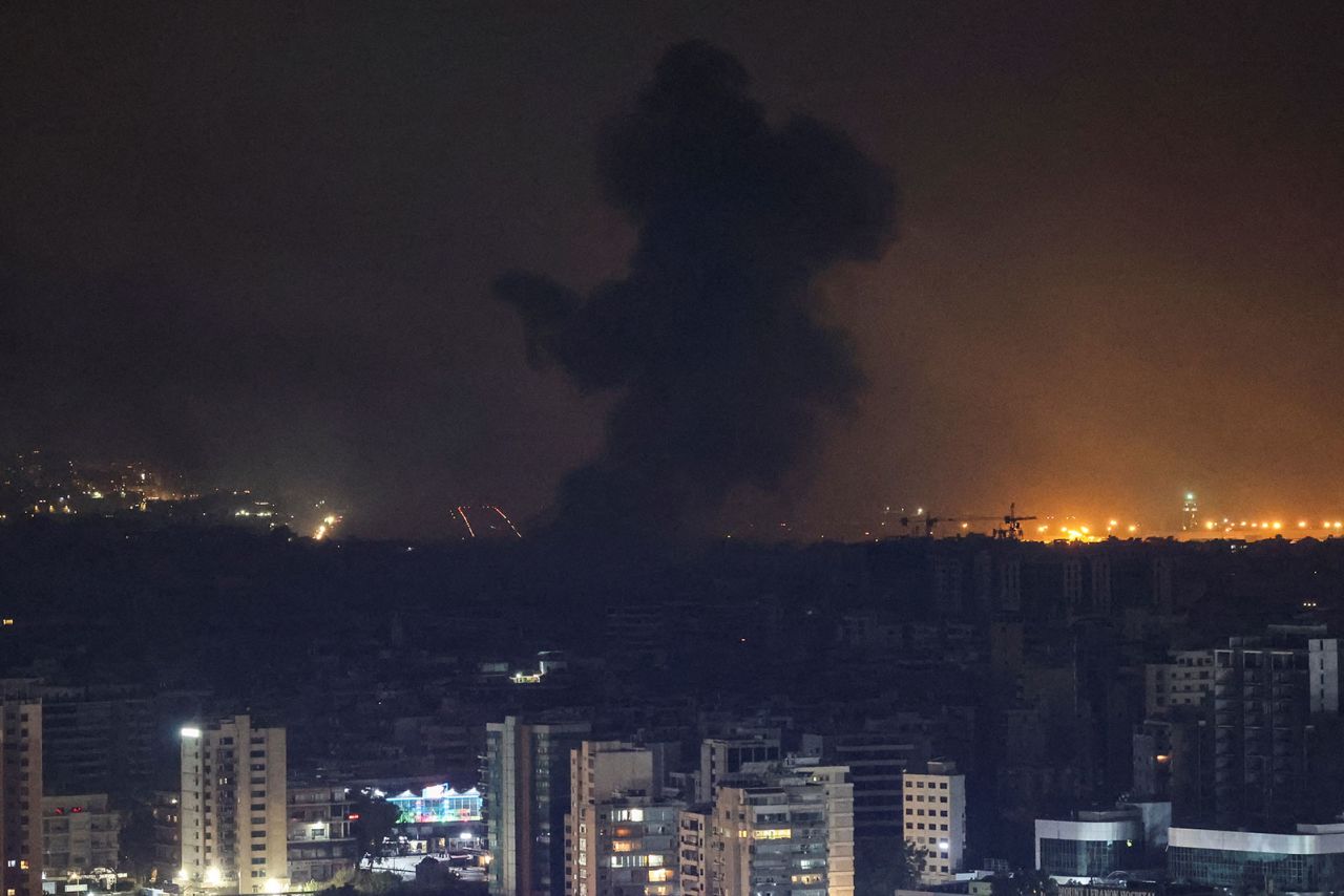 Smoke billows over Beirut's southern suburbs after a strike, as seen from Sin El Fil, Lebanon, on Monday, October 7.