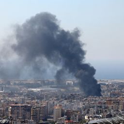 Smoke rises in Beirut's southern suburbs after a strike, amid the ongoing hostilities between Hezbollah and Israeli forces, as seen from Hadath, Lebanon, October 8, 2024. REUTERS/Mohamed Azakir