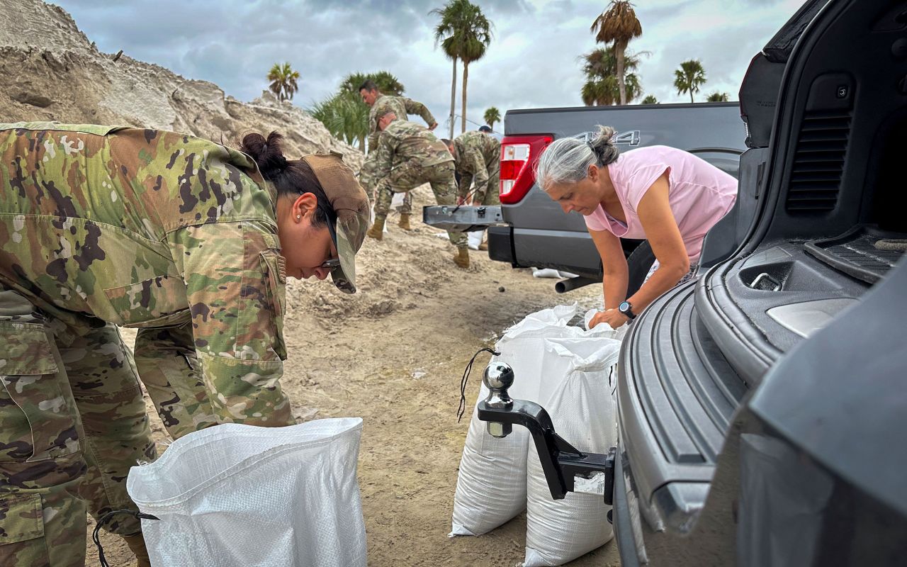 People fills sandbags ahead of Hurricane Milton at MacDill Air Force Base in Tampa, Florida, on October 7.